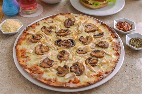 Pizza con champiñones